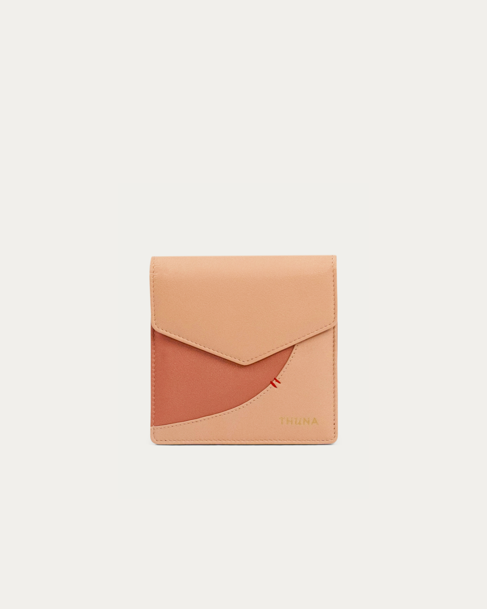 Small peach-colored envelope-style pouch - Kuwait bags - KSA