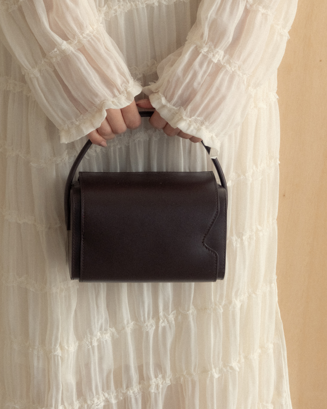 Raia chocolate leather handbag