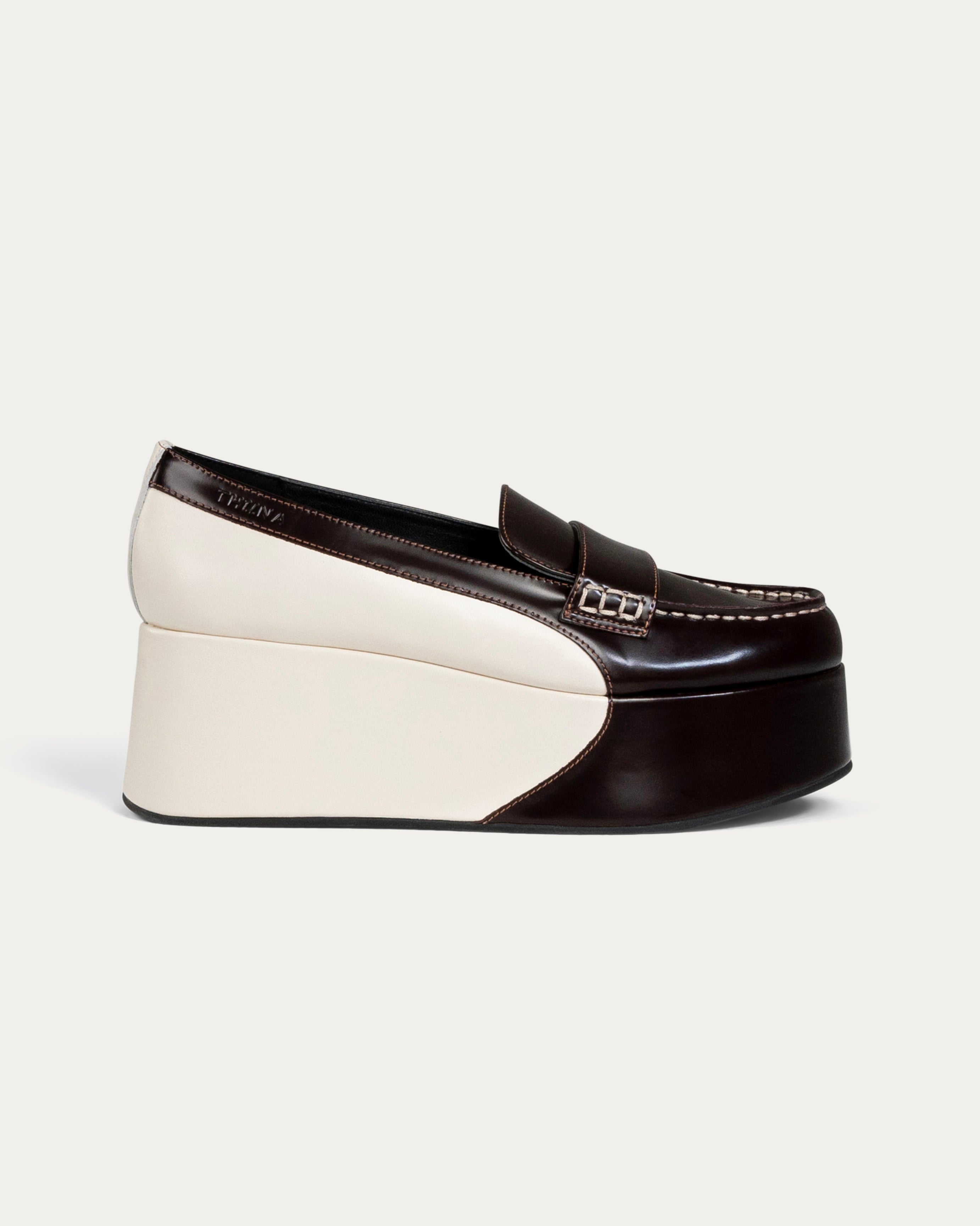 Black and white wedge shoe on a light gray background - Neve brown platform loafer - THUNA Kuwait - KSA